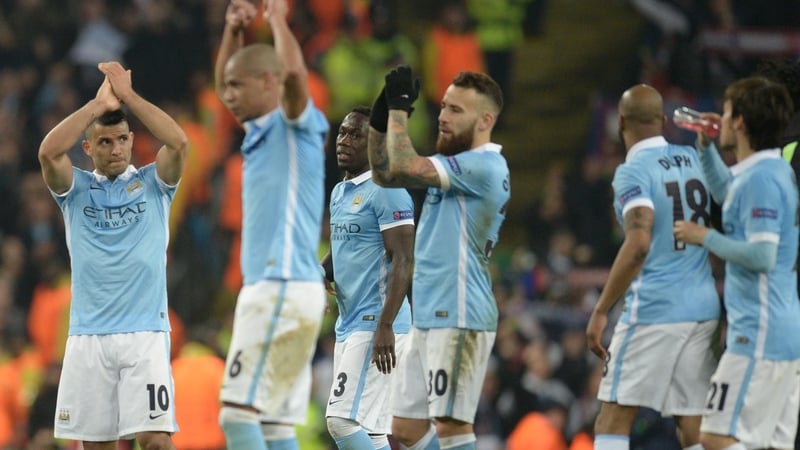 Man City players celebrate victory over PSG