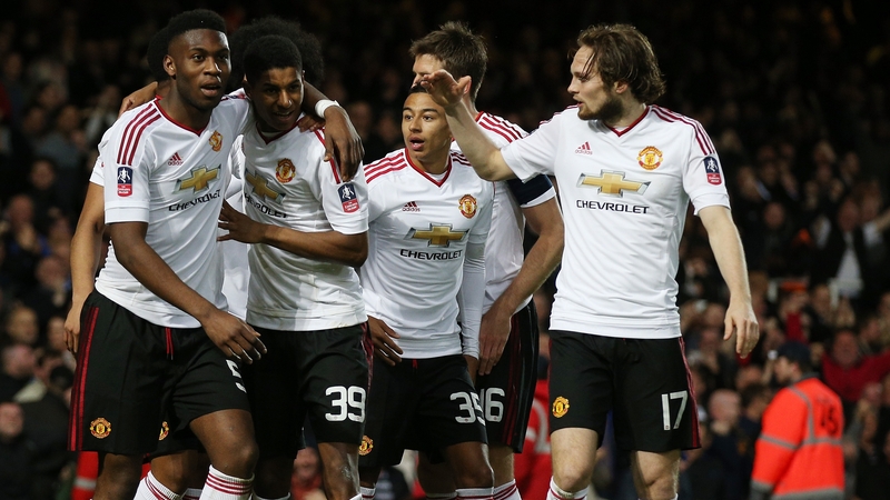 Manchester United players celebrate Marcus Rashford's opening goal