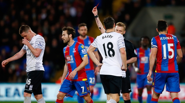 James McCarthy is shown red but Everton held on for a point