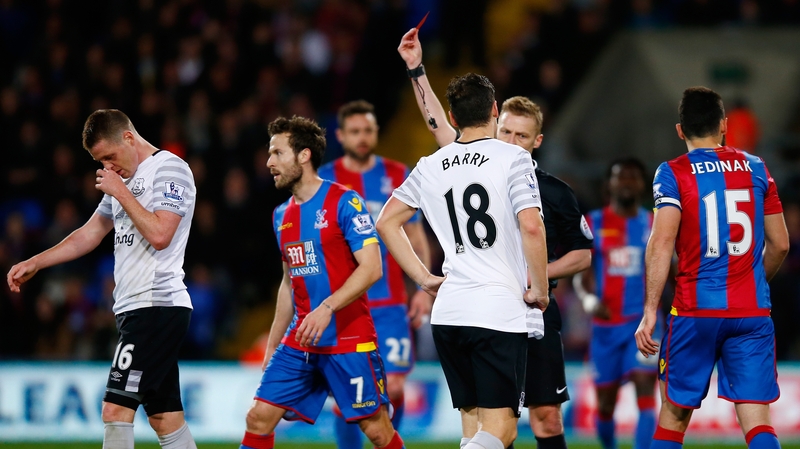 James McCarthy is shown red but Everton held on for a point