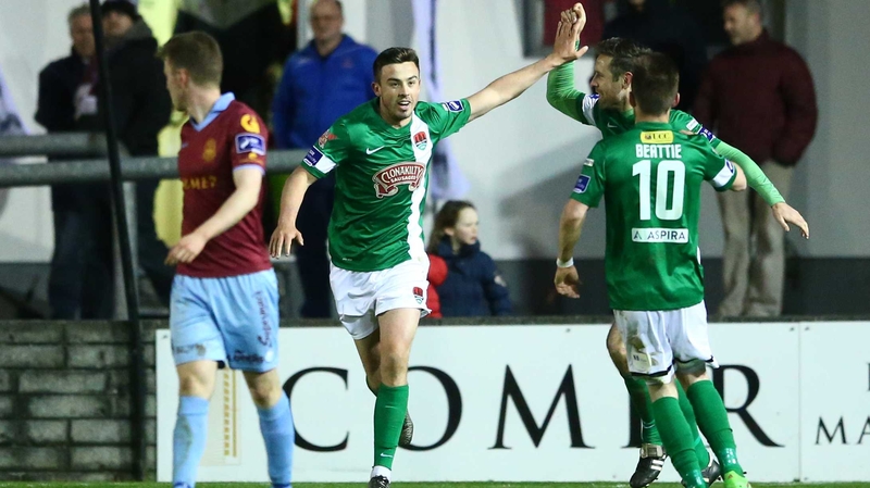 Cork’s Eoghan O’Connell (L) celebrates with Steven Beattie and Alan Bennett