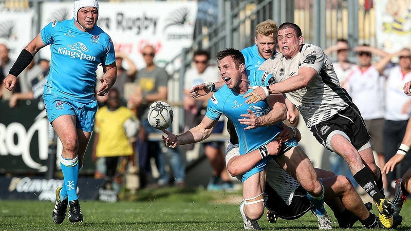 Tommy Bowe offloads as he comes under pressure at Stadio Sergio Lanfranchi
