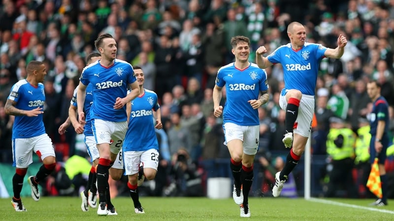 Kenny Miller (R) celebrates his goal