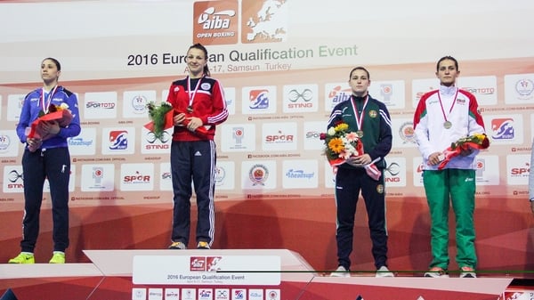 Katie Taylor receives her bronze medal on the winners podium
