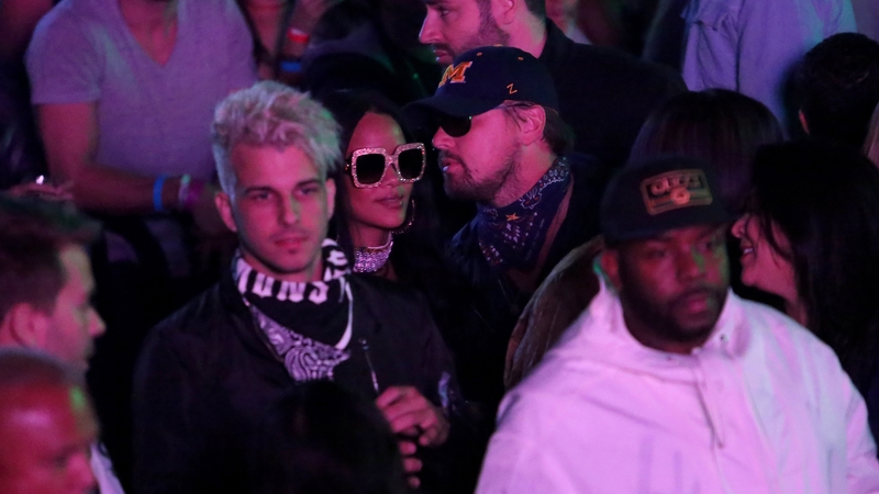 Leonardo DiCaprio whispers in Rihanna's ear at Coachella