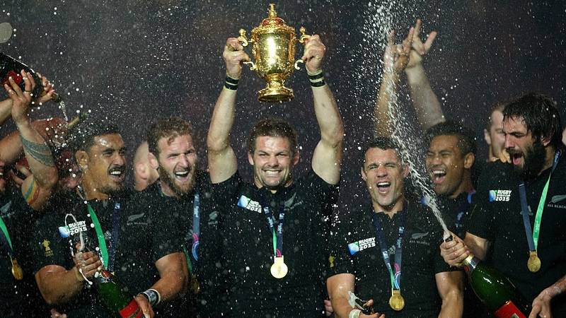 Richie McCaw holds aloft the 2015 World Cup