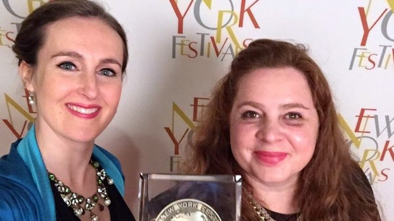 Producers Rachel Lysaght and Lindsay Campbell accepting the award in Las Vegas