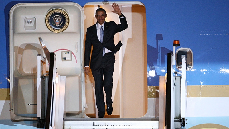 US President Barack Obama steps off Air Force One upon arrival at Stansted Airport
