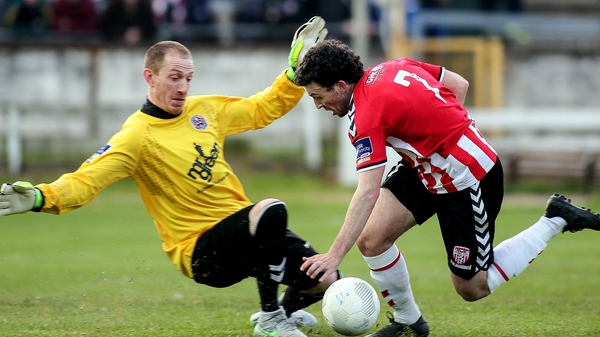 Derry City's Barry McNamee in action against Dean Delany