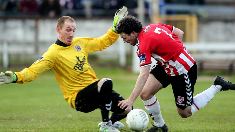 Derry City's Barry McNamee in action against Dean Delany