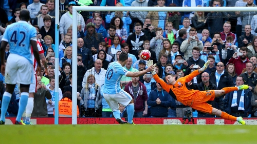 Sergio Aguero scores from the penalty spot