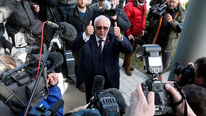 Trevor Hicks, whose daughters died in the Hillsborough disaster, gives the thumbs up outside the inquest in Warrington