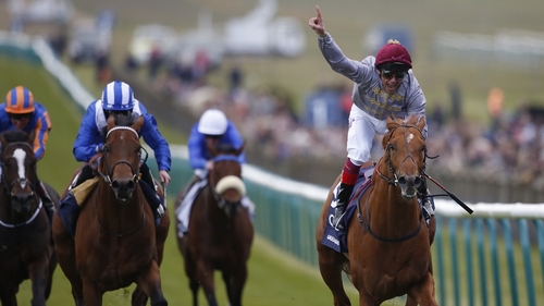 Frankie Dettori takes the plaudits as he crosses the winning line