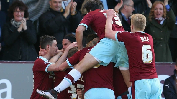 Burnley players celebrate Sam Vokes' header