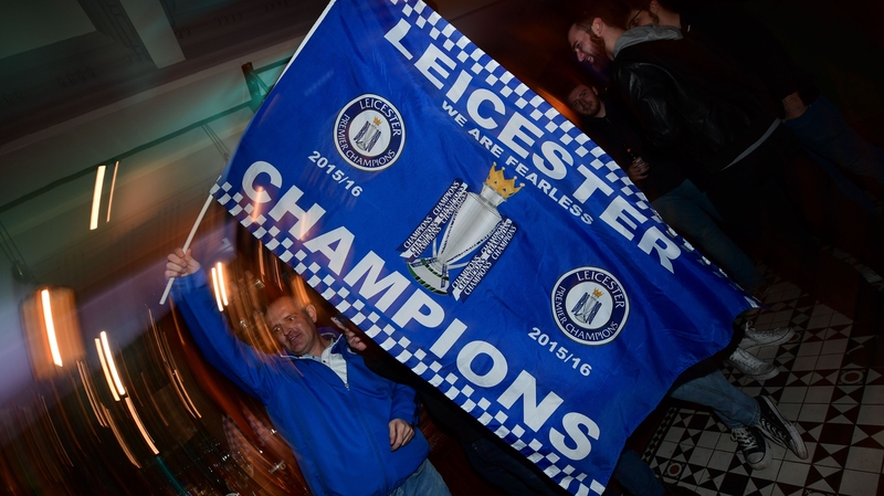 Leicester City fans celebrate winning the Premier League in central Leicester