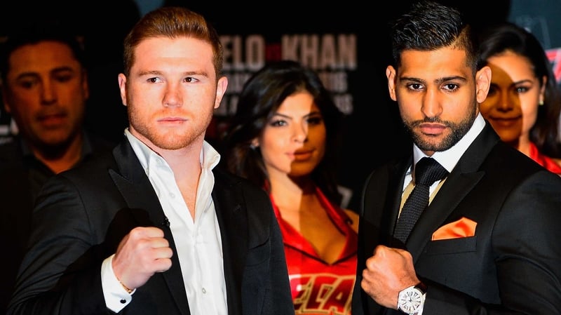Saul Alvarez (L) and Amir Khan