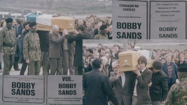 Funeral procession for Bobby Sands featuring placards