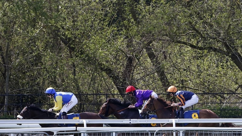 Silvestre De Sousa riding Dark Red (2R) on their way to winning The Gateley PLC Original Legal Thinking Handicap Stakes at