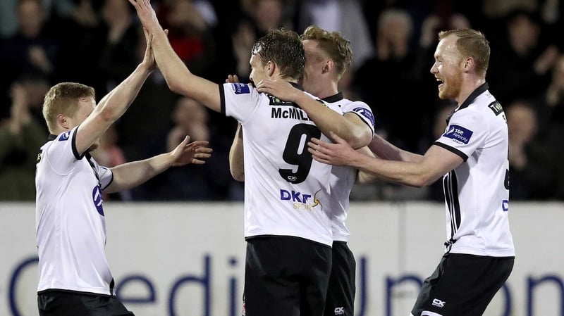 David McMillan celebrates with his team-mates