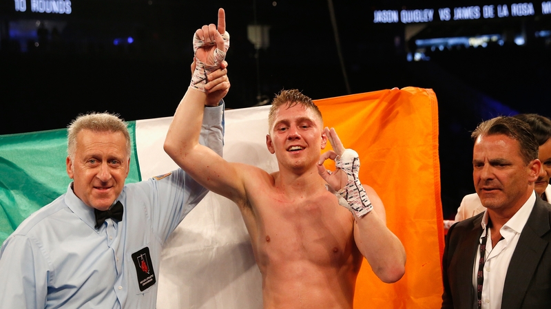 Jason Quigley celebrates his unanimous-decision victory over James De La Rosa during the middleweight fight at T-Mobile Arena