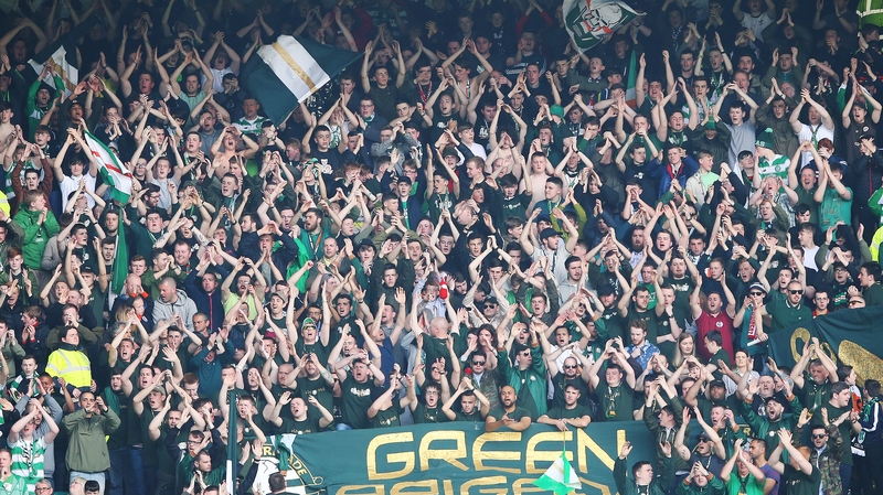 Celtic fans salute the Bhoys