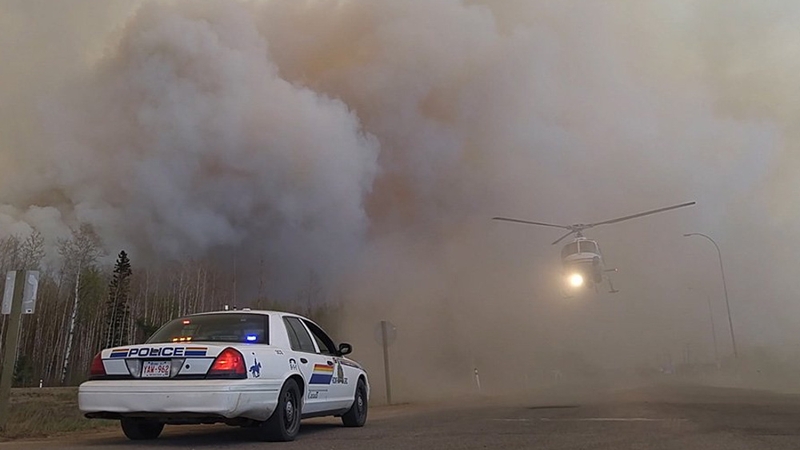 Wildfires in the Alberta oil patch could shave as much as 1.25 percentage points off growth in the next quarter