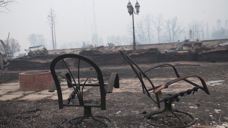 Home foundations and skeletons of possessions are all that remain in some places