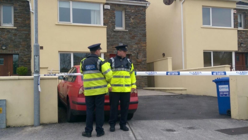 The house where the man's body was found has been sealed off