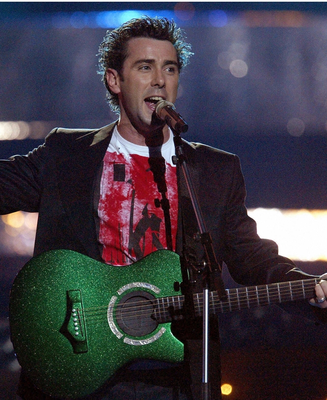Mickey Harte, who represented Ireland in 2003 - funky boy-next-door look complete with green-lit guitar.