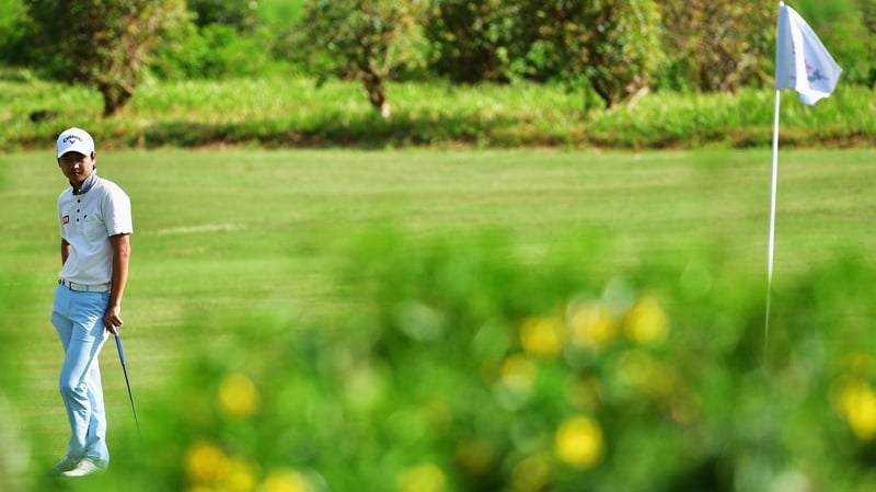 Wang Jeunghun of Korea is one shot off the lead