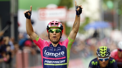 Diego Ulissi of team Lampre-Merida celebrates as he crosses the finish line to win the 11th stage of the 99th Giro d'Italia