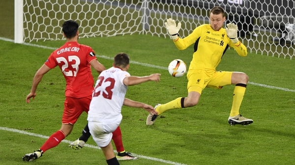 Sevilla defender Coke scores against Liverpool
