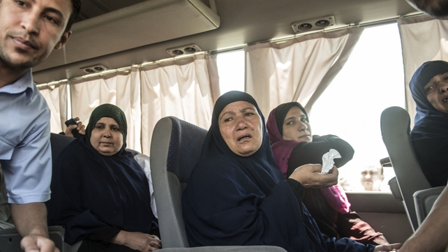 Relatives of those on board the EgyptAir plane are transported to a gathering point at Cairo airport