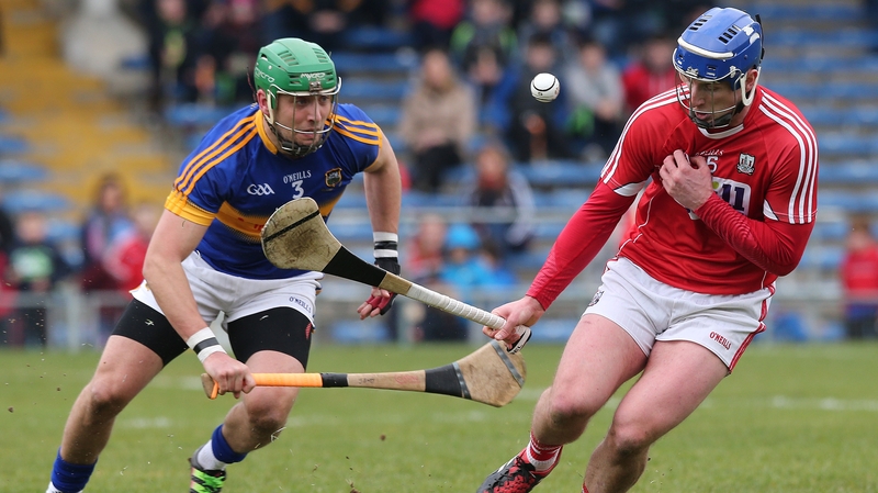 Tipperary's James Barry tackles Patrick Horgan of Cork in the side's league meeting in March