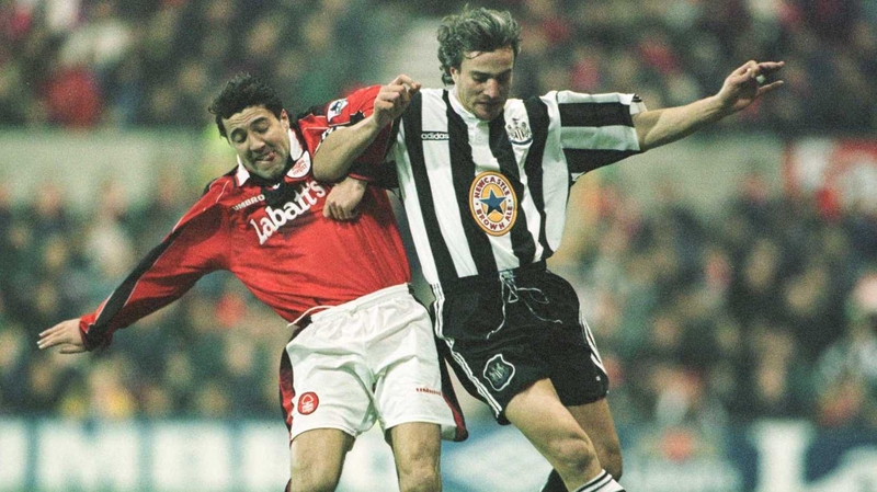 David Ginola (R) in full flight in his playing days