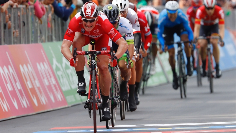 Andre Greipel crosses the finish line in the tourist resort of Bibione