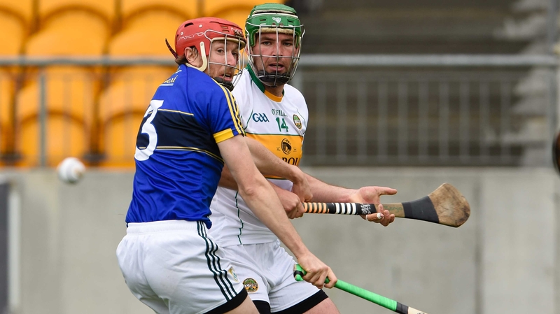 Joe Bergin of Offaly and Patrick Kelly of Kerry