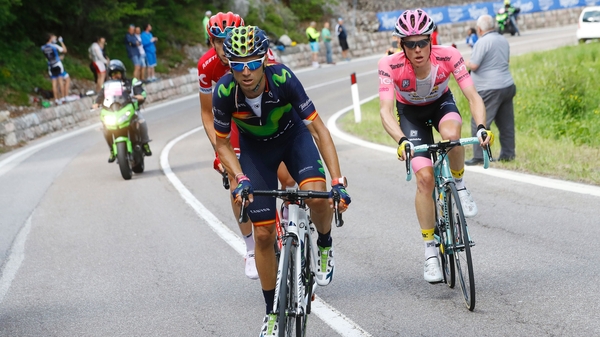 Stage winner Alejandro Valverde rides ahead of the pink jersey of Steven Kruijswijk at the Giro d'Italia