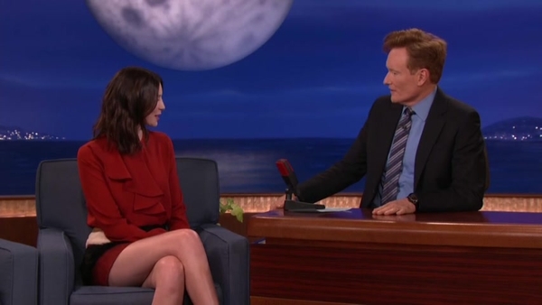Spot the pale Celtic-skinned one? Caitriona Balfe with Conan O'Brien