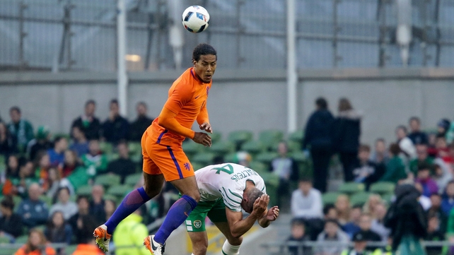 Jon Walters is challenged by Virgil Van Dijk