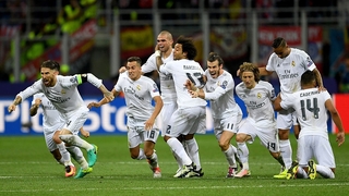 Real Madrid players celebrate after winning the Champions League Final