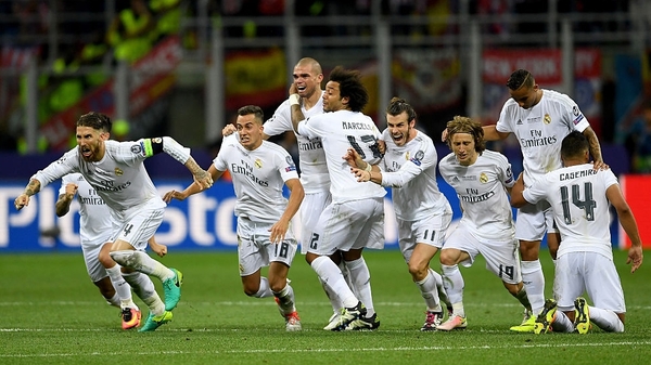 Real Madrid players celebrate after winning the Champions League Final