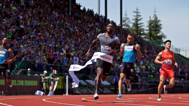 Justin Gatlin crosses the finish line in first place at Hayward Field
