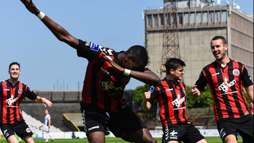 Ismahil Akinade celebrates after scoring the second goal of the game at Dalymount Park