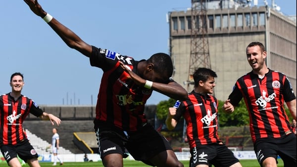 Ismahil Akinade celebrates after scoring the second goal of the game at Dalymount Park