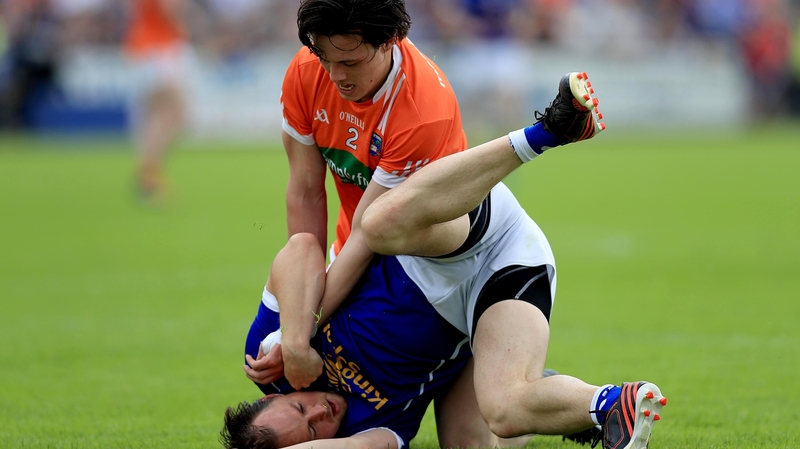Armagh's James Morgan battles with Seanie Johnston off the ball