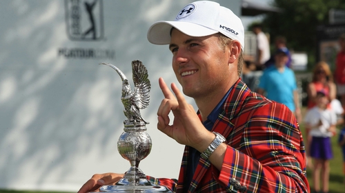Jordan Spieth poses with the trophy