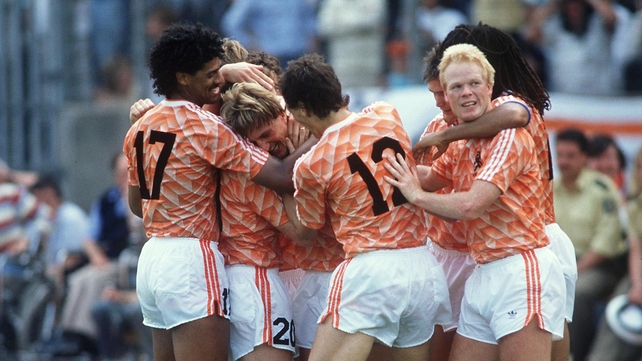 1988 - Wim Kieft is mobbed by his team-mates after his goal put the Irish out of the tournament