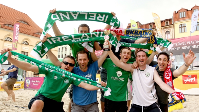 2012 - Ireland fans celebrate after winning a beach volleyball game organized by the City of Torun