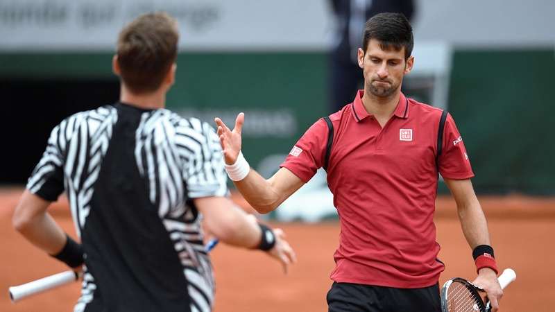 Djokovic (right) made light work of Tomas Berdych